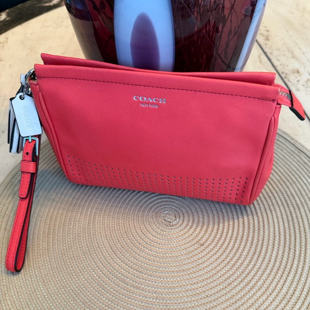 Coach Legacy Collectible Leather Wristlet in Watermelon with perforated bottom